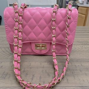 Pink quilted handbag
